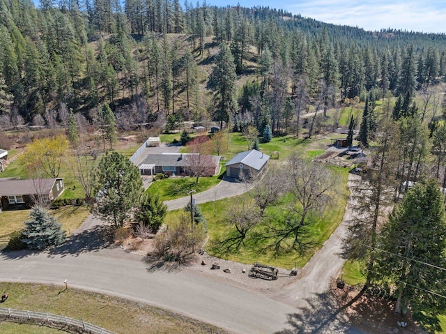 aerial view featuring a view of trees