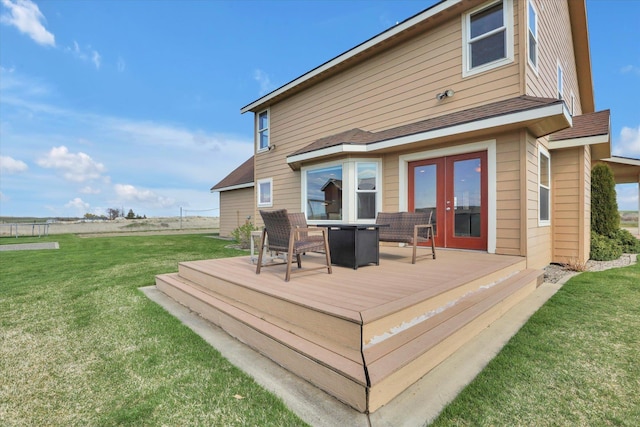 28222 N Wild Rose Ln, Davenport, WA 99122 - back of property featuring french doors, a yard, and a deck