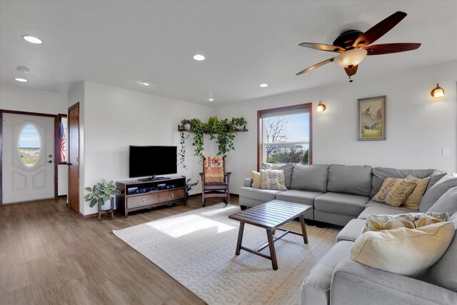 28222 N Wild Rose Ln, Davenport, WA 99122 - living room featuring baseboards, a ceiling fan, wood finished floors, and recessed lighting