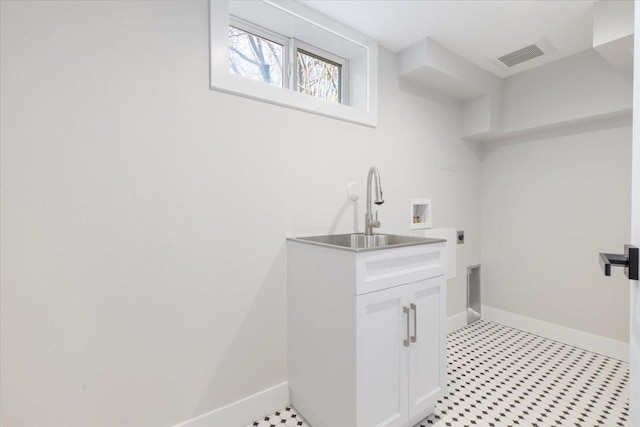 laundry room featuring washer hookup, visible vents, baseboards, and electric dryer hookup