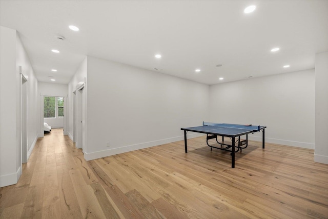 27603 N Bruce Rd, Chattaroy, WA 99003 - rec room with baseboards, light wood-type flooring, and recessed lighting