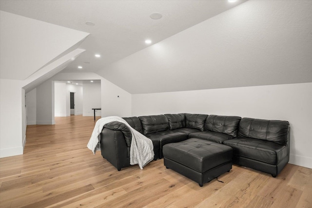 27603 N Bruce Rd, Chattaroy, WA 99003 - living area with recessed lighting, baseboards, vaulted ceiling, and light wood-style flooring