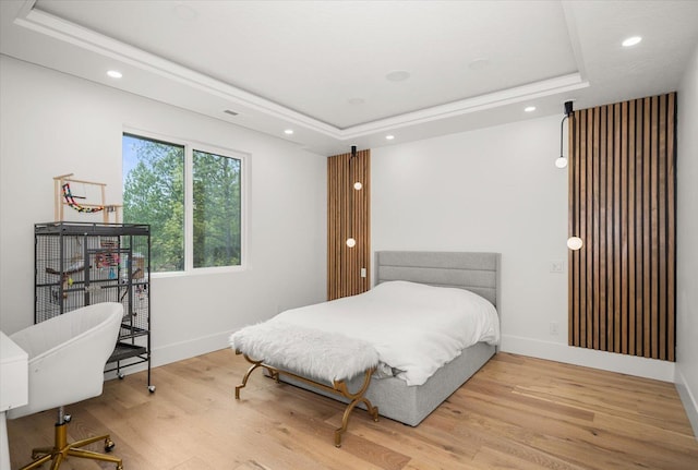 27603 N Bruce Rd, Chattaroy, WA 99003 - bedroom with baseboards, wood finished floors, a tray ceiling, and recessed lighting