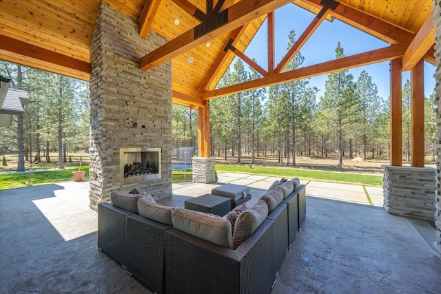 27603 N Bruce Rd, Chattaroy, WA 99003 - view of patio / terrace featuring an outdoor living space with a fireplace