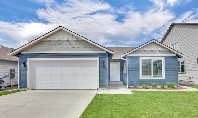 ranch-style house featuring board and batten siding, an attached garage, a front lawn, and concrete driveway