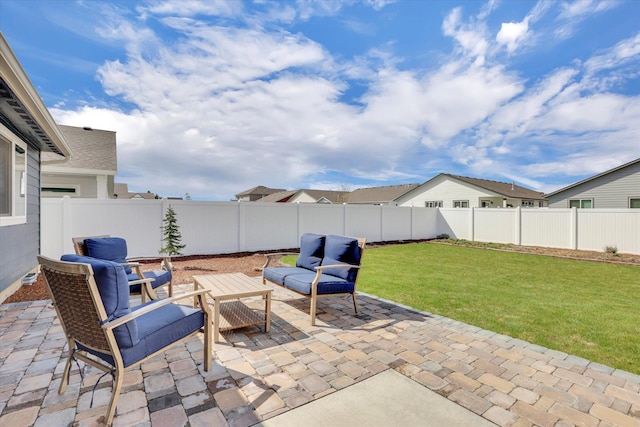 view of patio / terrace with a fenced backyard and an outdoor living space