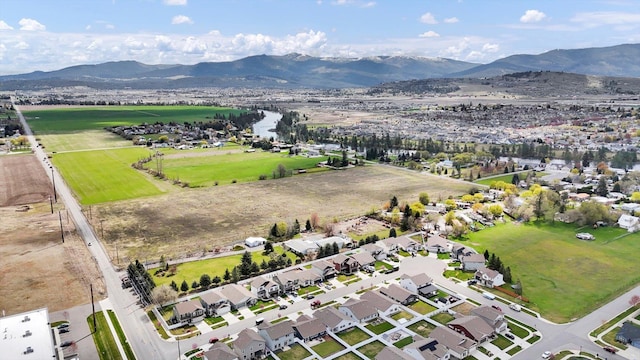 aerial view with a mountain view and a residential view