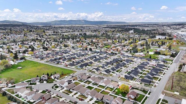 bird's eye view with a residential view and a mountain view