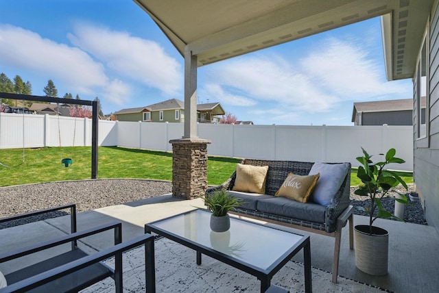 view of patio / terrace with outdoor lounge area and a fenced backyard