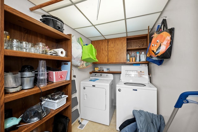 washroom with washer and dryer and laundry area
