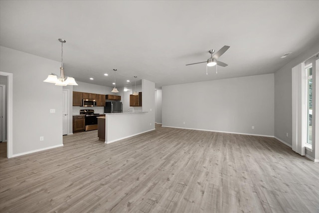 unfurnished living room with recessed lighting, ceiling fan, baseboards, and light wood-type flooring