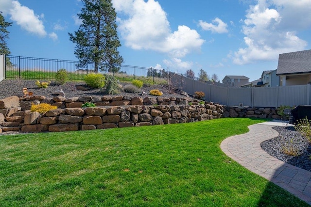 view of yard featuring a fenced backyard