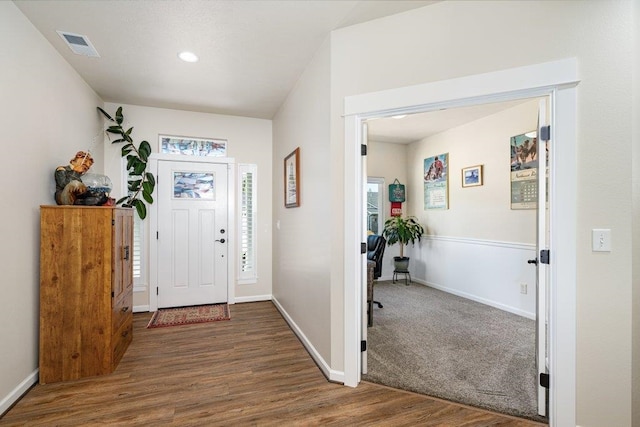 entrance foyer with baseboards, visible vents, wood finished floors, and recessed lighting