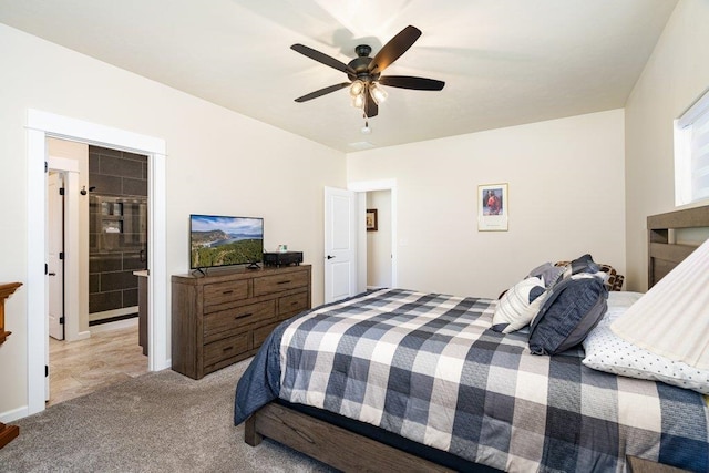 bedroom with ceiling fan and light carpet