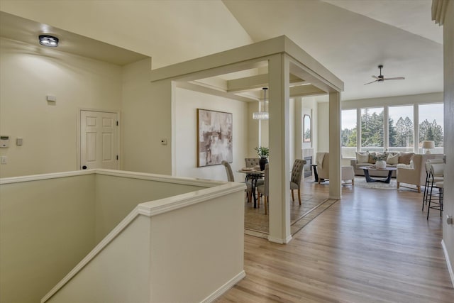 1814 S Viewcrest Ln Unit 1814, Spokane Valley, WA 99212 - hallway featuring light wood finished floors and an upstairs landing