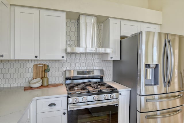 1814 S Viewcrest Ln Unit 1814, Spokane Valley, WA 99212 - kitchen with appliances with stainless steel finishes, wall chimney exhaust hood, white cabinetry, and tasteful backsplash