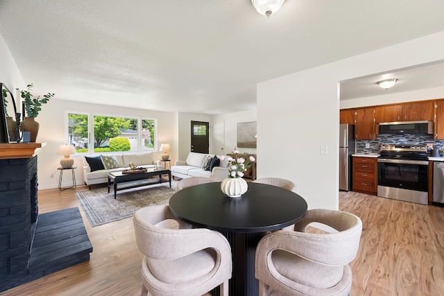 11904 E 22nd Ave, Spokane Valley, WA 99206 - dining area featuring light wood-type flooring