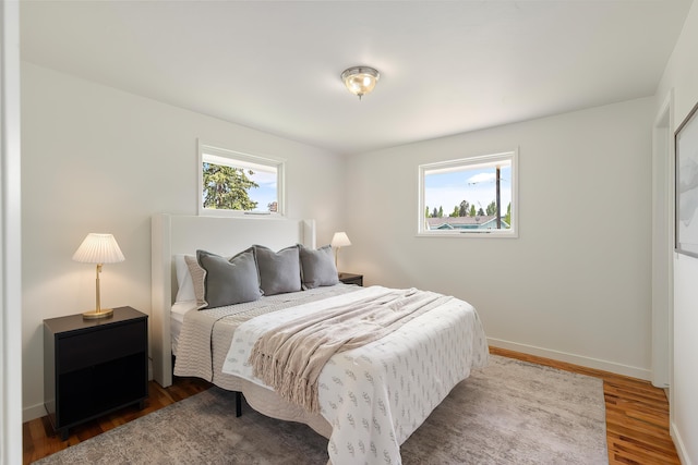 11904 E 22nd Ave, Spokane Valley, WA 99206 - bedroom featuring wood finished floors and baseboards