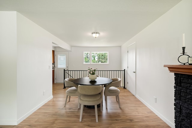 11904 E 22nd Ave, Spokane Valley, WA 99206 - dining area featuring light wood-style floors and baseboards
