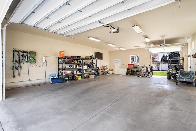 garage featuring a garage door opener