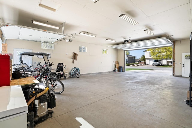 garage featuring a garage door opener