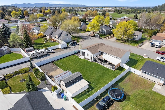 birds eye view of property featuring a mountain view and a residential view