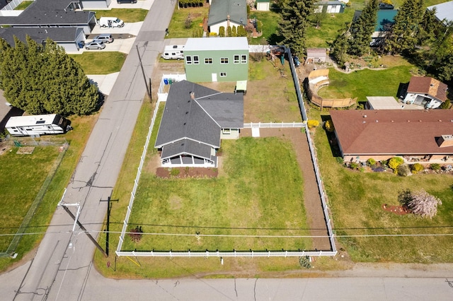 birds eye view of property with a residential view