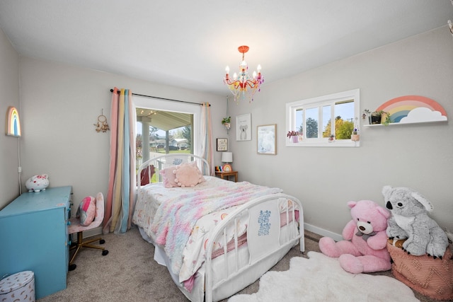 bedroom featuring a notable chandelier and carpet flooring