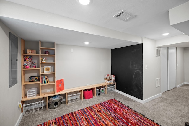 rec room featuring visible vents, carpet flooring, and baseboards