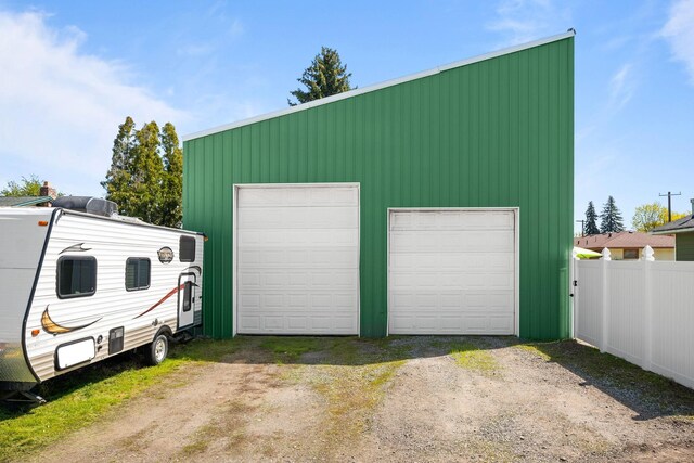 detached garage with fence