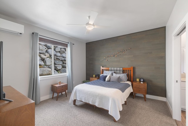 3306 N Ladalia Dr, Coeur D Alene, ID 83814 - bedroom with an accent wall, a wall mounted air conditioner, baseboards, and light carpet