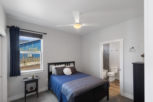 3306 N Ladalia Dr, Coeur D Alene, ID 83814 - carpeted bedroom with a ceiling fan, baseboards, and ensuite bath