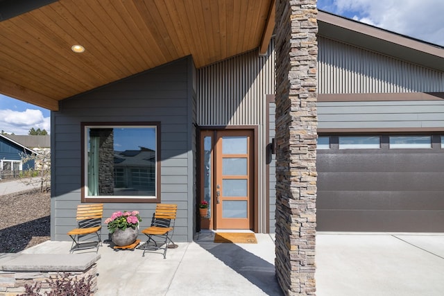 3306 N Ladalia Dr, Coeur D Alene, ID 83814 - doorway to property featuring a garage