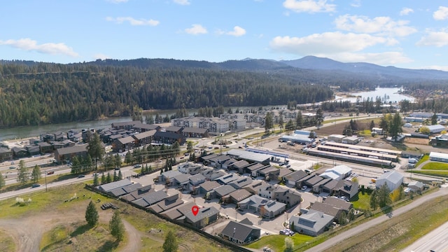 3306 N Ladalia Dr, Coeur D Alene, ID 83814 - aerial view featuring a residential view, a water and mountain view, and a wooded view