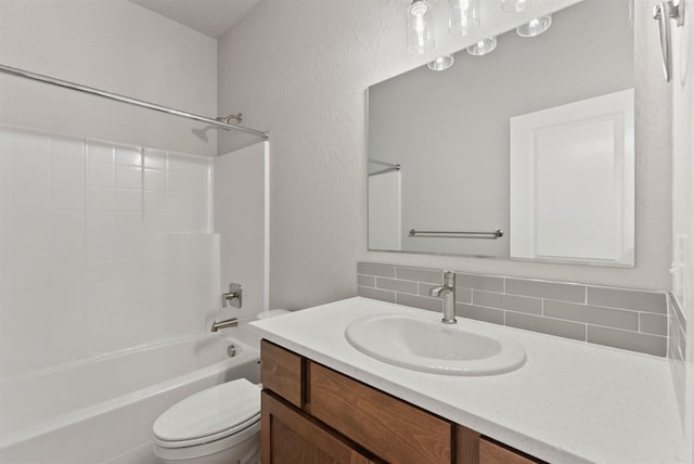 bathroom with shower / tub combination, vanity, toilet, and decorative backsplash