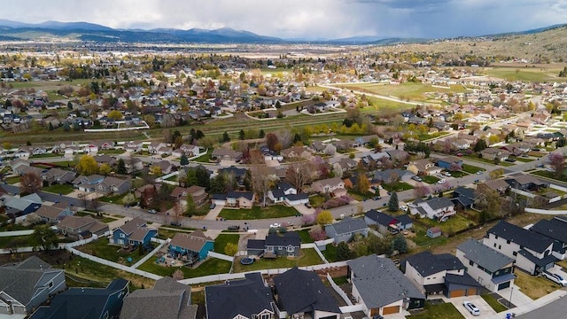 bird's eye view with a residential view and a mountain view