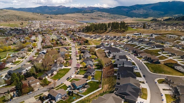 drone / aerial view featuring a mountain view and a residential view
