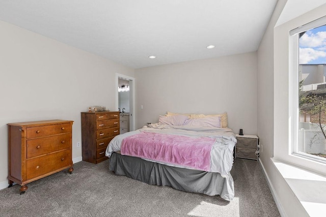 carpeted bedroom featuring recessed lighting and baseboards