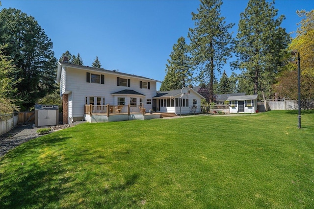 2711 S Pittsburg St, Spokane, WA 99203 - back of house featuring a wooden deck and a chimney