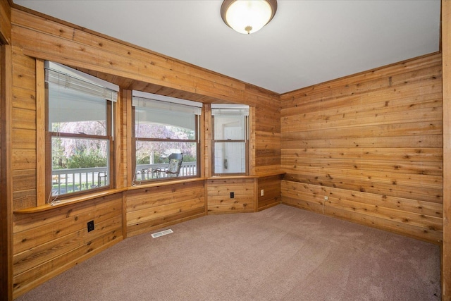 2711 S Pittsburg St, Spokane, WA 99203 - empty room featuring wooden walls and carpet flooring
