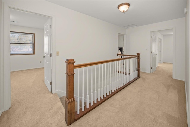 2711 S Pittsburg St, Spokane, WA 99203 - hall with an upstairs landing, carpet flooring, and baseboards