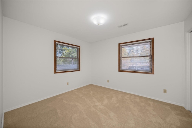 2711 S Pittsburg St, Spokane, WA 99203 - unfurnished room with light carpet and baseboards