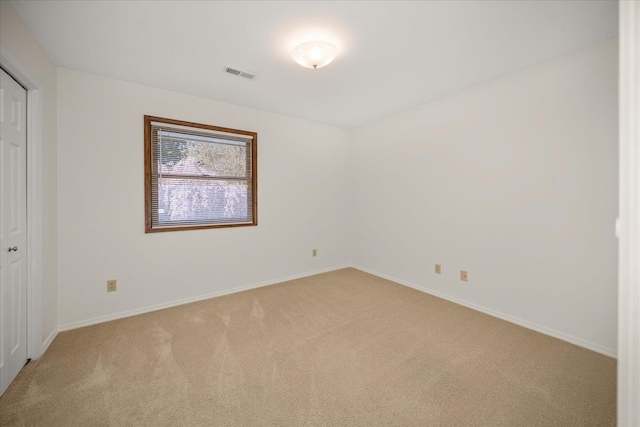 2711 S Pittsburg St, Spokane, WA 99203 - unfurnished bedroom with light carpet, baseboards, and a closet