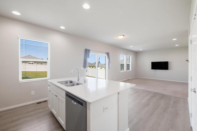 1102 S Best Rd, Spokane Valley, WA 99037 - kitchen featuring stainless steel dishwasher, white cabinets, recessed lighting, a center island with sink, and light countertops