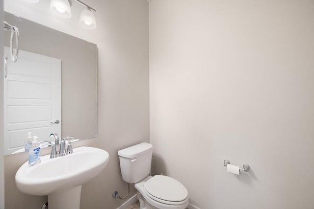 1102 S Best Rd, Spokane Valley, WA 99037 - bathroom featuring toilet and a sink
