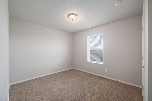1102 S Best Rd, Spokane Valley, WA 99037 - carpeted spare room featuring a smoke detector and a textured ceiling