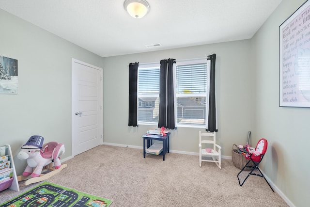 recreation room with visible vents, carpet flooring, and baseboards