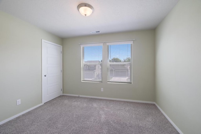 1102 S Best Rd, Spokane Valley, WA 99037 - carpeted spare room featuring baseboards