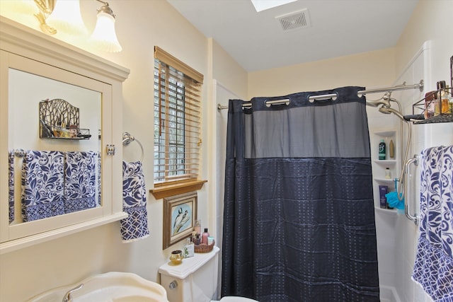 9306 E Lake Rd, Elk, WA 99009 - full bath with a shower with shower curtain and visible vents