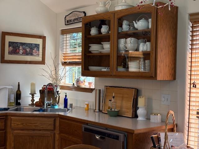 9306 E Lake Rd, Elk, WA 99009 - bar with stainless steel dishwasher, decorative backsplash, and a sink